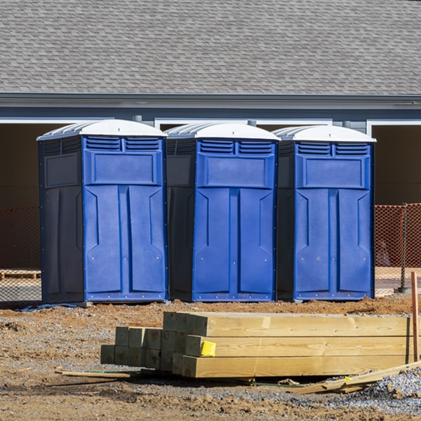 what is the cost difference between standard and deluxe portable restroom rentals in Whitfield